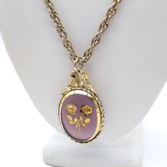 "Whiting Davis Roses Pendant Necklace, Vintage Pastel Glass Oval with Intaglio Carved Flowers in Gold on Gold Tone Chain Measurement * 24\" chain; 2\" x 1-1/4\" pendant Condition * Very nice condition. Gently used. Size: Womens 24\" Condition: Pre-Owned Good" Yellow Gold Oval Necklace With Intaglio, Formal Oval Intaglio Necklace, Victorian Formal Necklace With Intaglio, Formal Engraved Necklace With Oval Cabochon, Formal Engraved Oval Cabochon Necklace, Ornate Oval Cameo Necklace, Victorian Rose Design Jewelry For Formal Occasions, Vintage Hallmarked Oval Cabochon Necklace, Vintage Oval Intaglio Jewelry