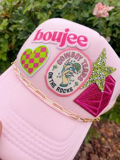 Giving all the pink cowgirl vibes with the unique trucker hat. This one of a kind design is sure to stand out in a crowd.   SnapBack closure  foam front, mesh back  one of a kind  one size fits all   adult fitting Trucker Hats With Patches, Women With Hat, Hat Chain, Cowgirl Vibes, Slouch Socks, Pink Cowgirl, Cow Girl, Hat For Women, Baseball Caps