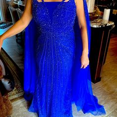 Beautiful Royal Blue Dress With Beaded Cape New Blue Embellished Floor-length Mother Of The Bride Dress, Elegant Blue Gown With Rhinestones, Blue Beaded Evening Dress For Wedding, Blue Beaded Wedding Evening Dress, Blue Rhinestone Evening Gown, Blue Floor-length Evening Dress With Rhinestones, Blue Evening Dress With Rhinestones For Gala, Blue Rhinestone Evening Dress For Gala, Blue Sequined Mother Of The Bride Dress For Gala