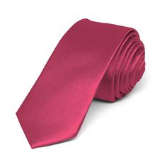 This ruby red solid color skinny tie is part of our trendiest line of neckties. It features a 2-inch width, just like what all the young celebrities are wearing. A light satin finish provides an extra sharp look. We recommend this shade for a deep red/slightly pink color. Product Features • Skinny 2" width, at the widest point • 57" length, tip to tip• Color is ruby red • Made from 100% Polyester • Satin finish • Dry clean only • Imported Fitted Burgundy Ties For Black Tie Events, Classic Red Suit And Tie Accessories, Classic Red Adjustable Tie, Classic Adjustable Red Suit And Tie Accessories, Classic Adjustable Red Ties, Red Ties, Fun Tie, Young Celebrities, Ties For Men