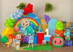 the birthday party is decorated with balloons, toys and other items for children's birthdays