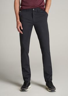 American-Tall-Men-Traveler-Chino-Pants-Black-front Black Slim Fit Straight Leg Chinos, Business Casual Black Chinos With Welt Pockets, Black Tapered Leg Chinos For Business Casual, Black Tapered Leg Chinos For Business, Tailored Black Chinos With Welt Pockets, Tailored Black Straight Leg Chinos, Classic Black Slim Fit Chinos, Classic Black Tapered Leg Chinos, Black Straight Leg Chinos For Business Casual