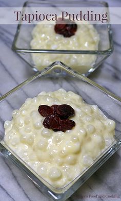 two square glass dishes filled with food on top of a marble countertop and the words tapioca pudding above them