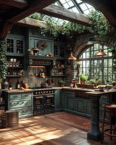 a kitchen with lots of green cupboards and wooden flooring, surrounded by an arched window