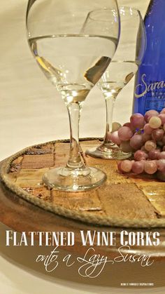 two wine glasses and some grapes on a wooden tray with the words flattened wine corks