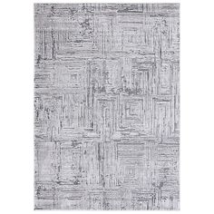 a gray rug with squares and lines on it