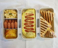 three plastic containers filled with different types of food