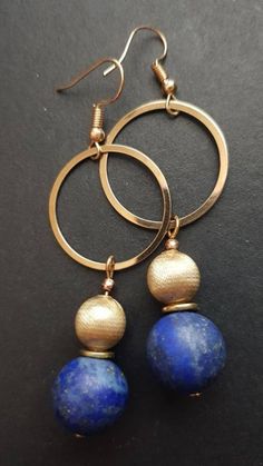 Lapis lazuli earrings Blue Brass Round Jewelry, Blue Round Brass Jewelry, Gold Lapis Lazuli Pierced Earrings, Gold Pierced Earrings With Lapis Lazuli, Elegant Gold Hoop Earrings With Natural Stones, Blue Round Beads Spiritual Earrings, Gold Lapis Lazuli Drop Earrings, Gold Lapis Lazuli Earrings, Blue Spiritual Earrings With Round Beads