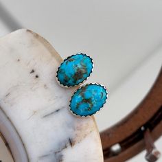 Handmade, Blue Kingman Turquoise Stud Earrings for Women, Sterling Silver, Great Gift for Her: These sterling silver stud earrings features genuine Kingman Turquoise stones.  The Kingman Turquoise stones are 14mm x 10mm (9/16" x 3/8").  The large included backs are 9mm (3/8") in diameter.   The Turquoise was mined near Kingman Arizona and has been stabilized. Stabilized turquoise is natural turquoise that has been treated to stabilize the color and the stone. It is real turquoise and not dyed.  The blue color of the stones is fantastic.  These Kingman Turquoise stones really pop in these handmade settings.   We made the new sterling silver settings.  They were left a little "rough" to enhance the handmade rustic look.  We didn't want them to look like they were mass produced in a factory. Turquoise Oval Earrings For Anniversary, Oval Turquoise Earrings For Anniversary, Southwestern Blue Earrings For Gift, Blue Southwestern Style Earrings For Gift, Nickel-free Blue Southwestern Earrings, Southwestern Blue Earrings For Pierced Ears, Southwestern Style Blue Pierced Earrings, Southwestern Style Blue Earrings For Pierced Ears, Artisan Turquoise Oval Earrings