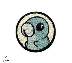 a patch with an image of a cartoon character in the shape of a circle, on top of a white background