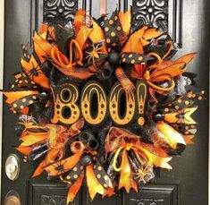 a halloween wreath with the word boo on it