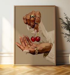 a painting of two hands holding cherries