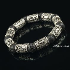 Viking Bracelet - Scandinavian Bracelet - Bracelet with Runes - Elder futhark runes - Lava bead bracelet - Futhark runes - Viking Jewelry  Beautiful gift idea for women, men, Christmas, Valentine's Day, Birthday, Father's Day or any other occasion.  Great accessory for all viking fans.  Each bracelet has approx. 9 runes (depending on selected length) with powerful meanings according Norse and Celtic mythologies and lava stones. Lava stones are great aroma oil diffusers.   Different runes and gem Runes Elder Futhark, Cat Eye Jewelry, Rune Viking, Mens Beaded Necklaces, Lava Bead Bracelet, Norse Jewelry, Elder Futhark Runes, Scandinavian Jewelry, Futhark Runes