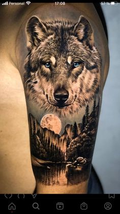 a man's arm with a wolf tattoo on it, and trees in the background