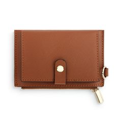 Our cognac mini leather wallet is functional and stylish. Zippered coin pouch 6 card slots 3 slip pockets Ring to attach keys or lanyard Size: 5.5"w x 3.5"h Materials: faux leather Care Instructions: Wipe with Damp Cloth Vendor: Demdaco Versatile Brown Wallet With Card Slots, Brown Travel Card Holder With Key Clip, Brown Card Holder With Key Clip For Daily Use, Brown Bifold Card Holder With Interior Key Chain, Versatile Brown Coin Purse With Card Slots, Everyday Brown Card Holder With Zipper, Mini Wallet, Coin Pouch, Leather Care