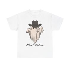 Western-inspired T-shirt featuring a ghost malone design, perfect for Halloween and fall. This unisex heavy cotton tee offers a comfy, relaxed fit with a classic crew neckline that can blend into any casual or semi-formal occasion. Relevant for fans of Post Malone and those looking for a unique holiday shirt. Product features - Shoulder tape for added stability - Knitted in one piece without side seams - Highly elastic ribbed knit collar - Made from strong and smooth specially spun fibers - Medium fabric made of 100% sustainable and durable cotton Care instructions - Machine wash: warm (max 40C or 105F) - Non-chlorine: bleach as needed - Tumble dry: medium - Do not iron - Do not dryclean Hip Hop Halloween T-shirt For Streetwear, Hip Hop Halloween Tops With Screen Print, Unisex T-shirt For Fall Streetwear, Fall Concert T-shirt With Band Logo, Band Logo T-shirt For Fall Concert, Halloween Streetwear Shirt With Sublimation Print, Halloween Crew Neck Tops With Band Logo, Halloween Concert T-shirt With Screen Print, Fall Band Merch T-shirt With Logo