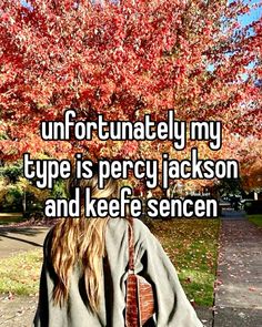 a woman with her back to the camera under a tree that says, unfortunately my type is percy jackson and keep