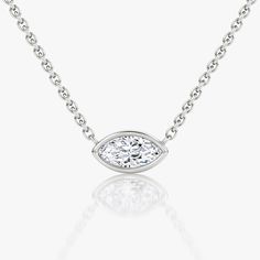 The Bezel Solitaire Necklace combines vintage-inspired detail and modern appeal together for a look that’s timelessly elegant. Jewellery Showroom, Solitaire Necklace, Bespoke Rings, Solitaire Necklaces, Accessories Jewelry Necklace, Marquise Cut, Three Stone, Bezel Setting, Necklace Designs