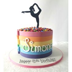 a birthday cake with a figure on top