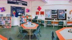 an indoor classroom with tables, chairs and desks for children to sit at in