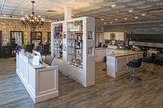 the inside of a salon with lots of counter space