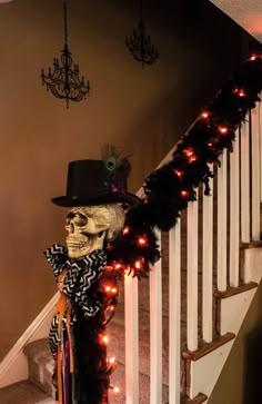 a decorated stair case with a skeleton wearing a top hat