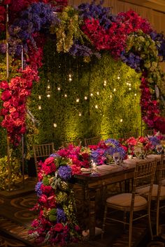 an instagram photo with flowers and lights on the wall behind it is being used as a wedding decoration