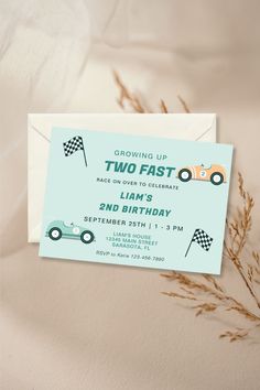 an envelope with a race car on it and the words two fast written in green