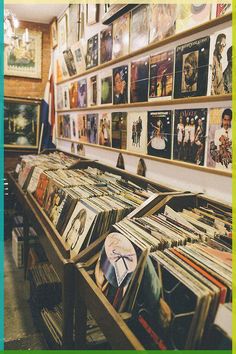 there are many records on display in the store