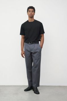 Information The Wayne Pants are relaxed pintuck chinos designed with a herringbone cotton twill fabric and detailed with front pleats. Details Self: 100% Cotton, Lining: 100% Cotton Relaxed Fit Full-Length Front Pleats Malachi is 6'0" and wearing a size LMeasurements: 39" Chest, 29" WaistStyle #PA166 Casual Cotton Bottoms With Pleated Waist, Cotton Pleated Straight Pants, Pleated Cotton Straight Pants, Pleated Cotton Trousers, Classic Relaxed Fit Chinos For Work, Classic High-waisted Cotton Chinos, High-waisted Pleated Cotton Pants, Cotton Pleated Pants, Pleated High-waisted Cotton Pants