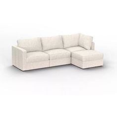 a white couch sitting on top of a white floor