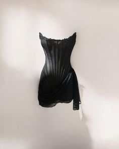 Introducing the new version of our viral black lace corset mini dress. This very is a bit more risquey with black mesh lining rather than the nude lining. Slightly see-through but can be worn with nothing under it as the skirt is lined! Featuring our signature corsetry and a lace up back, made to sculpt and shape. The drape can be draped across and tied or worn straight down! Lace Corset Mini Dress, Paris Moodboard, Corset Draping, Heiress Beverly Hills, Black Lace Corset, Mesh Corset, Corset Mini Dress, Lace Corset, Black Mesh