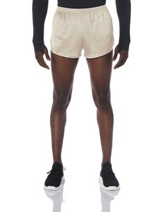 PRICES MAY VARY. Running short featuring a covered elastic waistband and dolphin hem Inside key pocket Inseam: 2.25" Moisture management technology Built-in brief liner for added comfort Tricot Fabric, Running Short, The Pouch, Range Of Motion, Running Shorts, Briefs, Built In, Key, Technology