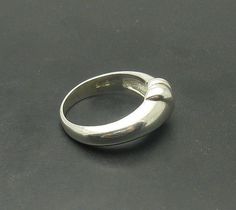 Sterling silver ring 925/1000. Stamped 925.Approximate weight 5.7 grams. Top width 1.0 cm (0.40 inches). All our jewels are made from solid sterling silver 925/1000 and are carefully crafted by hand in our family workshop. We dispatch your orders in 5 working days, worldwide and the postage is $5. We ship registered priority mail. Please allow 5-7 working days for delivery in Europe and 10-15 working days outside Europe. For any questions - please do not hesitate to contact me! Sterling Silver Hallmarked Dome Ring, Classic Sterling Silver Dome Ring With Open Band, Sterling Silver Formal Dome Ring With Round Band, Classic Sterling Silver Concave Rings, Sterling Silver Dome Ring For Formal Occasions, Sterling Silver Domed Anniversary Ring, Sterling Silver Domed Ring For Anniversary, Classic Silver Domed Rings, Silver Domed Rings For Anniversary