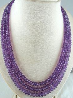 PRODUCT DETAILS LINE 3/CTS 505 AMETHYST FACETTED ROUND BEADS FINE QUALITY NECKLACE ALL NATURAL AMETHYST WELL MATCHED AMETHYST BEADS SIZES OF THE BEADS ARE FROM 7MM TO 6MM INNER LENGTH OF THE BEADS ARE 19 INCHES OUTER LENGTH OF THE BEADS ARE 21 INCHES BEST PRICE BEST QUALITY BUY IT NOW NOTE - #You will receive the same product you see in picture. #DEAR ETSY BUYERS PLEASE FEEL FREE TO ASK QUESTIONS #WE WILL BE GLAD TO ANSWER & SOLVE QUERY REGARDING THIS PRODUCTS #RETURN POLICY Every piece of j Luxury Faceted Round Bead Crystal Necklaces, Luxury Purple Pearl Necklace With Round Beads, Round Bead Necklace, White Moonstone, Silk Cord, Amethyst Beads, Rock Crystal, Beads Necklace, Best Buy