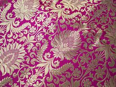 "Silk Brocade Banarasi Blended Silk Brocade Fabric by the Yard Banarasi Brocade Silk Magenta Gold Weaving for Wedding Dress Indian Brocade. This is a beautiful heavy benarse blended silk brocade floral design fabric in Magenta and Gold. ➤Product: Brocade Fabric ➤Fabric Type: Blended Silk (Viscose and Silk) Fine quality Zari Brocade Weaving from Banaras ➤Color: Magenta and Gold ➤Width: 44 inches. ➤Condition: New ➤ Code: bg349 ➤Listing for 1 Yard of fabric. ➤Care: Dry Clean Only This is known as \ Wedding Dress Indian, Silk Brocade Fabric, Banarasi Brocade, Wedding Dresses Indian, Bling Wedding Dress, Making Fabric, Striped Wedding, Silk Wedding Dress, For Wedding Dress