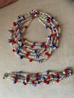 Outstanding early patriotic  Vendome  plaited/roped necklace and bracelet set from the 1940s  Gorgeous cluster detail with diamantes on clasps. signed on silver tone lozenge.  From my own collection.  Excellent vintage condition. Vintage Polished Beads Bracelet, Vintage Polished Bead Bracelet, Vintage Polished Beads Bracelet Jewelry, Vintage Faceted Beads Bracelet, Vintage Multi-strand Jewelry With Large Beads, Vintage Adjustable Polished Beads Jewelry, Patriotic Handmade Bracelet Jewelry, Handmade Patriotic Bracelet Jewelry, Adjustable Vintage Jewelry With Polished Beads