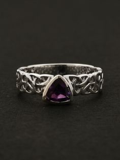 $35.00 | Create a lasting impression and turn heads wherever you go with this minimalistic Celtic knot ring in natural Amethyst. The perfect unique gift for her. Silver Celtic Rings, celtic rings women, celtic rings engagement, unique minimalistic wedding rings, minimalistic rings silver, minimalistic rings celtic, celtic knot designer ring, minimialistic rings stacking, silver enagegement ring, amethyst ring vintage, amethyst ring simple, amethyst ring silver, amethyst ring silver band, unique Silver Amethyst Ring, Spiritual Birthstone, Hallmarked Amethyst Round Stone Jewelry, Amethyst Jewelry With Accent Stones, Spiritual Amethyst Ring With Accent Stones, Symbolic Amethyst Purple Jewelry, Purple Amethyst Symbolic Jewelry, Symbolic Purple Amethyst Jewelry, Spiritual Amethyst Birthstone Ring, Silver Amethyst Ring In Mystical Style