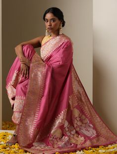 Introducing Kumudini: A Vision of RadianceStep into enchantment with our latest collection, inspired by the ethereal charm of Kumudini. Like morning sunlight, she radiates sweetness, illuminating her surroundings. Our collection captures her vibrant spirit, akin to a mesmerizing rainbow. Just as a rainbow holds life's colors, Kumudini embodies diverse qualities.Fiery yet kind, glamorous yet innocent, spirited yet enchanting — Kumudini's contrasts form a unique identity. Like colors in a painting Luxury Traditional Wear With Zari Weaving In Raw Silk, Luxury Traditional Katan Silk Wear, Luxury Silk Thread Ceremonial Saree, Luxury Pink Katan Silk Pre-draped Saree, Luxury Unstitched Katan Silk Saree, Luxury Multicolor Katan Silk Sets, Luxury Katan Silk Pre-draped Saree With Motifs, Luxury Handloom Katan Silk Traditional Wear, Luxury Katan Silk Embroidered Fabric For Festive