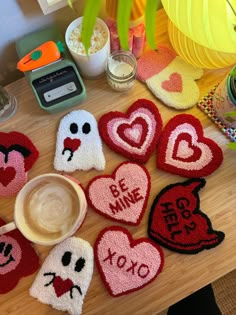 valentine's day decorations are arranged on a table