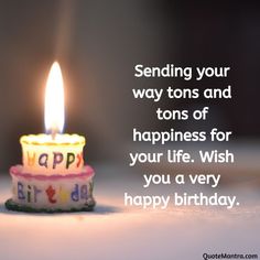 a birthday candle with the words sending your way tons and tons of happiness for your life wish you a very happy birthday