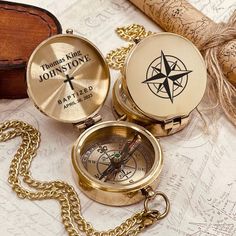 an antique compass and other items on a map