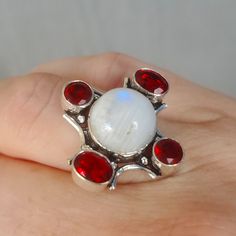 Brand New Handmade Rainbow Moonstone And Garnet Silver Ring. Size 8.25 925 Stamped New To Poshmark? Use Referral Code Kimberlyn222 To Receive $10. Oval White Ruby Gemstone Ring, Unique White Cabochon Moonstone Ring, White Birthstone Gemstones For Gifts, White Ruby Ring Gift, White Oval Gemstones For Gifts, Handmade White Moonstone Ring, Red Moonstone Gemstone Ring As Gift, Red Moonstone Gemstone Ring For A Gift, Red Moonstone Ring For Anniversary