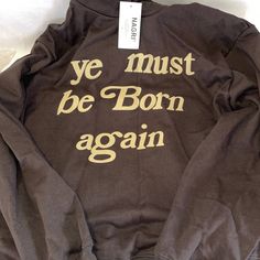 Nagri Ye Must Be Born Again Kanye Hoodie Size Xl Yeezy Nwt. New With Tags Brown Athleisure Sweatshirt For Streetwear, Ye Must Be Born Again, Kanye West Cover, Ye Must Be Born Again Hoodie, Kanye West Hoodie, Kanye Sweatshirt, Kanye West Tour, Brown Graphic Print Sweatshirt For Streetwear, Yeezus Kanye