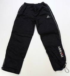 Rare Vintage ARMANI Spell Out Lined Joggers Track Pants 90s Streetwear Black measurements are included in the photographs flaws -light blemishes on front and back -cut off size tag Thanks for checking out DasCardHaus! We provide you great deals on vintage clothing items such as shirts, jackets and hats. All items are shipped out via USPS and we use eBay’s global shipping program for international orders. If you have any questions, comments or concerns please ask and we will get back to you as so 90s Style Black Sports Pants, Vintage Track Pants, Vintage Armani, Joggers Track Pants, 90s Streetwear, Size Tag, Jeans Pants, Vintage Clothing, Track Pants