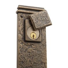 an old fashioned door handle with a keyhole and padlock on the front of it