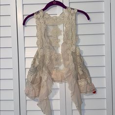 Nwt Virtuosa Collections Sleeveless Lace Vest. Cream Color. Great With Your Favorite Pair Of Jeans. Size M/L. Spring Sleeveless Stretch Vest, Beige Fitted Lace Tank Top, Fitted Sleeveless Vest For Vacation, Chic Cami Vest For Beach, Chic Beach Vest In Camisole Style, Lace Sleeveless Tank Top For Layering, Chic Beach Vest Camisole, Chic Camisole Vest For Beach, Chic Camisole Vest For The Beach