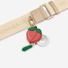 The SABRÉMOJI™ Fruit Charm - Peach – MAISON de SABRÉ Polished Brass, Tech Accessories, Apple Watch