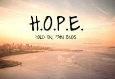 the words hope hold on pan ends are written in black ink over an image of a beach