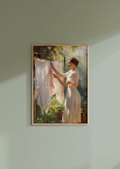 a painting of a woman drying her clothes